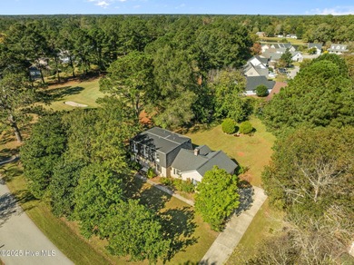 Charming house near 1st Tee of Rock Creek Golf Course. This 2 on Rock Creek Country Club in North Carolina - for sale on GolfHomes.com, golf home, golf lot