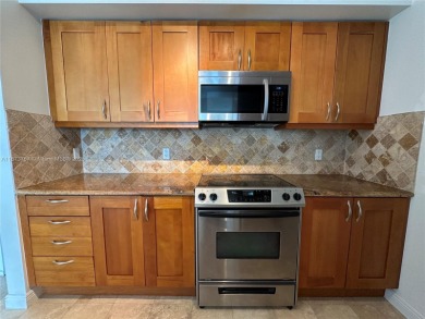 Location! Location! Location!***Motivated Seller***Split floor on The Diplomat Golf Resort and Spa in Florida - for sale on GolfHomes.com, golf home, golf lot