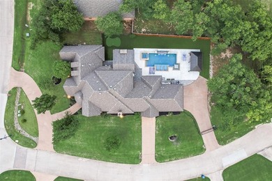 Stunning luxury home on a huge corner lot in the only 24-7 gated on The Golf Club at Resort Eagle Mountain Lake in Texas - for sale on GolfHomes.com, golf home, golf lot
