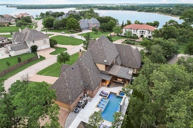 Stunning luxury home on a huge corner lot in the only 24-7 gated on The Golf Club at Resort Eagle Mountain Lake in Texas - for sale on GolfHomes.com, golf home, golf lot