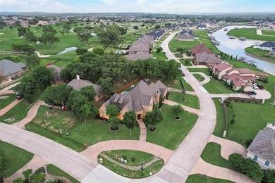 Stunning luxury home on a huge corner lot in the only 24-7 gated on The Golf Club at Resort Eagle Mountain Lake in Texas - for sale on GolfHomes.com, golf home, golf lot