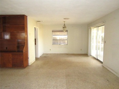 Discover the perfect blend of comfort, convenience, and location on Babe Zaharias Golf Course in Florida - for sale on GolfHomes.com, golf home, golf lot