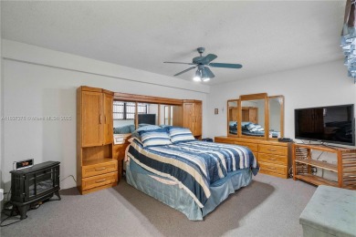 Enjoy breathtaking lakefront views  spectacular sunsets from on Pembroke Lakes Golf Club in Florida - for sale on GolfHomes.com, golf home, golf lot
