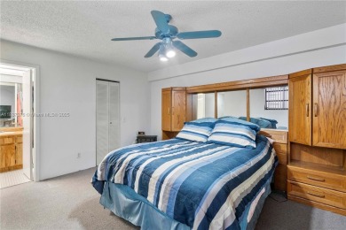 Enjoy breathtaking lakefront views  spectacular sunsets from on Pembroke Lakes Golf Club in Florida - for sale on GolfHomes.com, golf home, golf lot