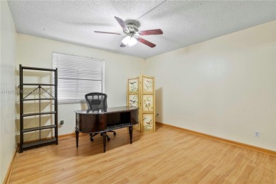 Enjoy breathtaking lakefront views  spectacular sunsets from on Pembroke Lakes Golf Club in Florida - for sale on GolfHomes.com, golf home, golf lot