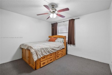 Enjoy breathtaking lakefront views  spectacular sunsets from on Pembroke Lakes Golf Club in Florida - for sale on GolfHomes.com, golf home, golf lot