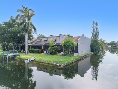 Enjoy breathtaking lakefront views  spectacular sunsets from on Pembroke Lakes Golf Club in Florida - for sale on GolfHomes.com, golf home, golf lot