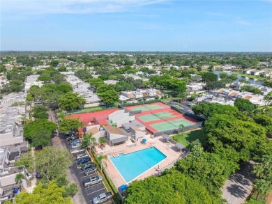 Enjoy breathtaking lakefront views  spectacular sunsets from on Pembroke Lakes Golf Club in Florida - for sale on GolfHomes.com, golf home, golf lot