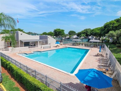 Enjoy breathtaking lakefront views  spectacular sunsets from on Pembroke Lakes Golf Club in Florida - for sale on GolfHomes.com, golf home, golf lot