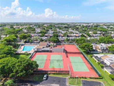 Enjoy breathtaking lakefront views  spectacular sunsets from on Pembroke Lakes Golf Club in Florida - for sale on GolfHomes.com, golf home, golf lot