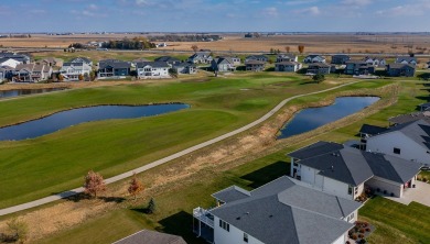 Welcome to a luxurious escape that effortlessly combines on Otter Creek Golf Course in Iowa - for sale on GolfHomes.com, golf home, golf lot