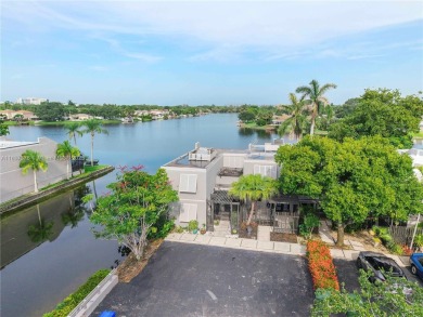 Enjoy breathtaking lakefront views  spectacular sunsets from on Pembroke Lakes Golf Club in Florida - for sale on GolfHomes.com, golf home, golf lot