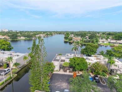 Enjoy breathtaking lakefront views  spectacular sunsets from on Pembroke Lakes Golf Club in Florida - for sale on GolfHomes.com, golf home, golf lot
