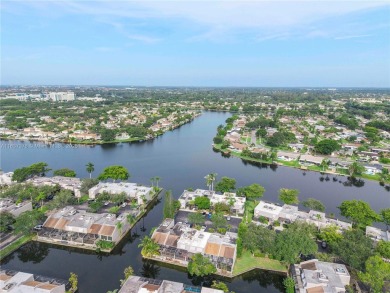 Enjoy breathtaking lakefront views  spectacular sunsets from on Pembroke Lakes Golf Club in Florida - for sale on GolfHomes.com, golf home, golf lot