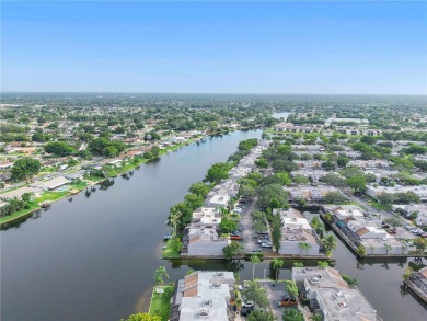 Enjoy breathtaking lakefront views  spectacular sunsets from on Pembroke Lakes Golf Club in Florida - for sale on GolfHomes.com, golf home, golf lot