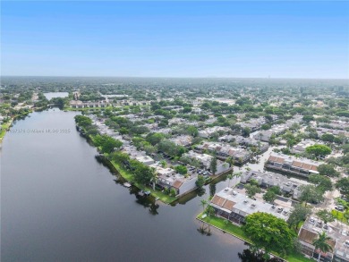 Enjoy breathtaking lakefront views  spectacular sunsets from on Pembroke Lakes Golf Club in Florida - for sale on GolfHomes.com, golf home, golf lot