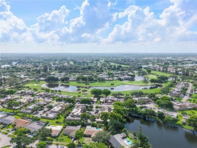 Enjoy breathtaking lakefront views  spectacular sunsets from on Pembroke Lakes Golf Club in Florida - for sale on GolfHomes.com, golf home, golf lot