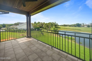 Nestled in a serene setting with views of a pond and golf course on Bay Point Resort Golf Club in Florida - for sale on GolfHomes.com, golf home, golf lot