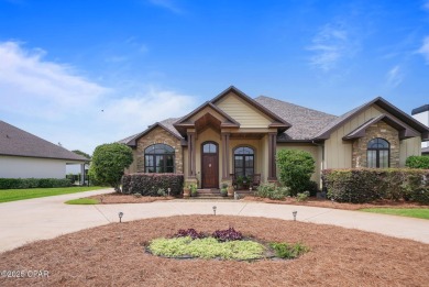 Nestled in a serene setting with views of a pond and golf course on Bay Point Resort Golf Club in Florida - for sale on GolfHomes.com, golf home, golf lot
