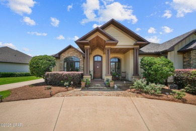 Nestled in a serene setting with views of a pond and golf course on Bay Point Resort Golf Club in Florida - for sale on GolfHomes.com, golf home, golf lot