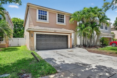 Spacious 5BR, 2.5BA home in Madison Green, Royal Palm Beach on The Links At Madison Green in Florida - for sale on GolfHomes.com, golf home, golf lot