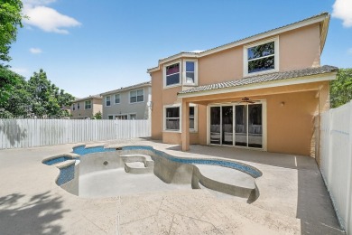 Spacious 5BR, 2.5BA home in Madison Green, Royal Palm Beach on The Links At Madison Green in Florida - for sale on GolfHomes.com, golf home, golf lot