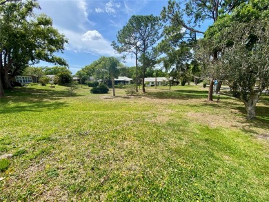 Under contract-accepting backup offers. A concrete block on Highland Lakes Executive Golf Course in Florida - for sale on GolfHomes.com, golf home, golf lot