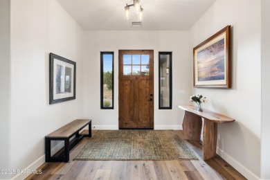 Completed in 2024, this residence enjoys a prime location along on Talking Rock Golf Club in Arizona - for sale on GolfHomes.com, golf home, golf lot