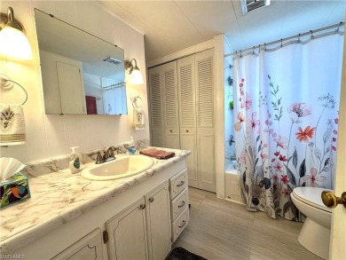 Welcome to this beautifully maintained 2 bedroom, 2 bath mobile on Breckenridge Golf and Country Club in Florida - for sale on GolfHomes.com, golf home, golf lot
