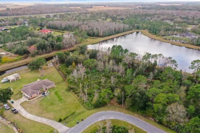 Build your custom dream home on this 1.98 acre lot backed on to on Wedgefield Golf Club in Florida - for sale on GolfHomes.com, golf home, golf lot