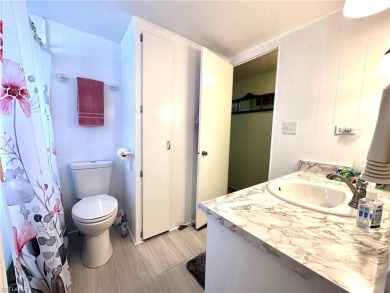 Welcome to this beautifully maintained 2 bedroom, 2 bath mobile on Breckenridge Golf and Country Club in Florida - for sale on GolfHomes.com, golf home, golf lot
