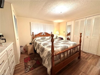 Welcome to this beautifully maintained 2 bedroom, 2 bath mobile on Breckenridge Golf and Country Club in Florida - for sale on GolfHomes.com, golf home, golf lot