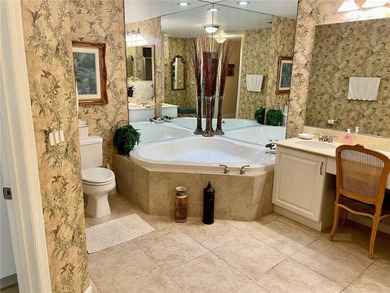 BEAUTIFUL VIZCAYA BOUGAINVILLEA UNIT. This first-floor unit on IMG Academies Golf and Country Club in Florida - for sale on GolfHomes.com, golf home, golf lot