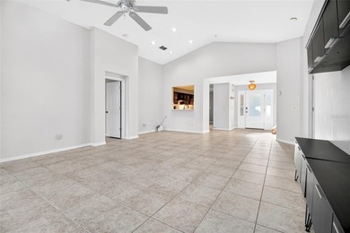 One or more photo(s) has been virtually staged. Tucked into a on Country Club of Mount Dora in Florida - for sale on GolfHomes.com, golf home, golf lot