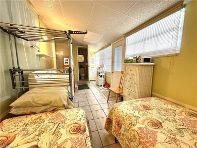 Welcome to this beautifully maintained 2 bedroom, 2 bath mobile on Breckenridge Golf and Country Club in Florida - for sale on GolfHomes.com, golf home, golf lot