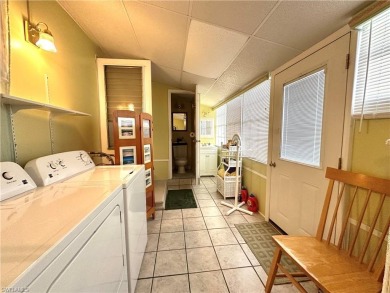 Welcome to this beautifully maintained 2 bedroom, 2 bath mobile on Breckenridge Golf and Country Club in Florida - for sale on GolfHomes.com, golf home, golf lot