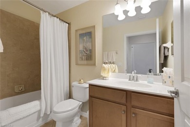 Experience effortless country club living in this beautifully on Heritage Bay Golf Course in Florida - for sale on GolfHomes.com, golf home, golf lot