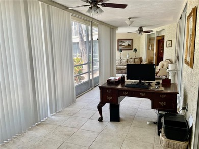 BEAUTIFUL VIZCAYA BOUGAINVILLEA UNIT. This first-floor unit on IMG Academies Golf and Country Club in Florida - for sale on GolfHomes.com, golf home, golf lot