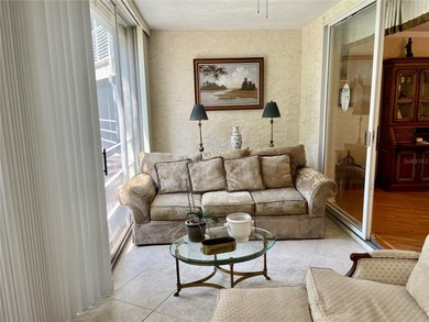 BEAUTIFUL VIZCAYA BOUGAINVILLEA UNIT. This first-floor unit on IMG Academies Golf and Country Club in Florida - for sale on GolfHomes.com, golf home, golf lot
