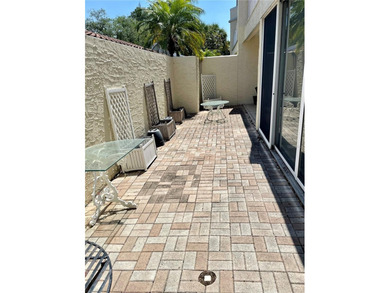 BEAUTIFUL VIZCAYA BOUGAINVILLEA UNIT. This first-floor unit on IMG Academies Golf and Country Club in Florida - for sale on GolfHomes.com, golf home, golf lot