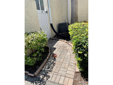 BEAUTIFUL VIZCAYA BOUGAINVILLEA UNIT. This first-floor unit on IMG Academies Golf and Country Club in Florida - for sale on GolfHomes.com, golf home, golf lot