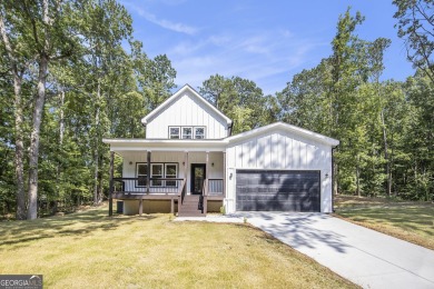 Welcome to this beautiful designed 4-bedroom, 3-bath home on Fairfield Plantation Golf and Country Club in Georgia - for sale on GolfHomes.com, golf home, golf lot