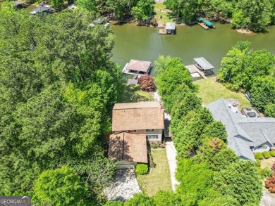 Welcome to this beautifully renovated lakefront home located in on Turtle Cove Golf Course in Georgia - for sale on GolfHomes.com, golf home, golf lot