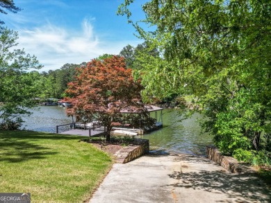 Welcome to this beautifully renovated lakefront home located in on Turtle Cove Golf Course in Georgia - for sale on GolfHomes.com, golf home, golf lot