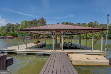 Welcome to this beautifully renovated lakefront home located in on Turtle Cove Golf Course in Georgia - for sale on GolfHomes.com, golf home, golf lot