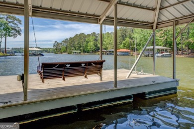 Welcome to this beautifully renovated lakefront home located in on Turtle Cove Golf Course in Georgia - for sale on GolfHomes.com, golf home, golf lot