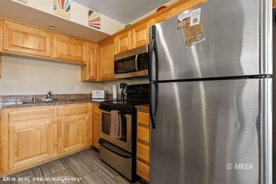 Welcome to 890 Kitty Hawk #2623, a fully furnished, turn-key on The Oasis Golf Club in Nevada - for sale on GolfHomes.com, golf home, golf lot