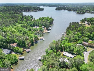 Welcome to this beautifully renovated lakefront home located in on Turtle Cove Golf Course in Georgia - for sale on GolfHomes.com, golf home, golf lot