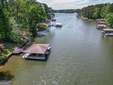 Welcome to this beautifully renovated lakefront home located in on Turtle Cove Golf Course in Georgia - for sale on GolfHomes.com, golf home, golf lot