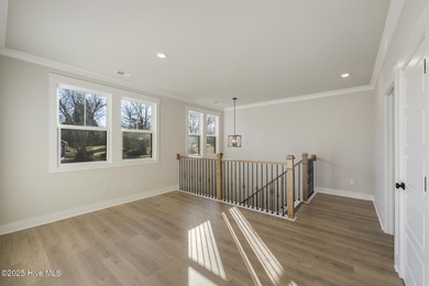 Introducing The Emmy - what a perfect name for a luxury on Brunswick Plantation and Golf Resorts in North Carolina - for sale on GolfHomes.com, golf home, golf lot